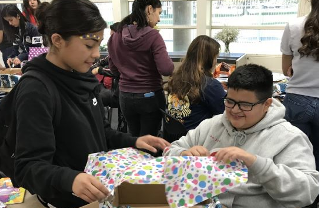  Students wrapping gifts